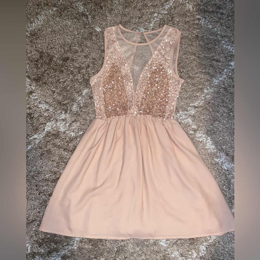 - Forever 21/ Sheer back sequin dress